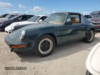 ✅ 1978 Porsche 911 • VIN: 9118212302 • Лот: 75277654. Опубликован ранее на Copart с пробегом Не указан. Бесплатный доступ к архиву аукционных продаж из США и подробный отчёт об истории автомобиля на DreamBid. Изображение 1.