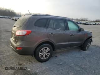 ✅ 2012 Hyundai Santa Fe GLS • VIN: 5XYZG4AG3CG135171 • Lot: 86797074. Listed on Copart with 191,222 mi. Free auction sales archive from the USA and detailed vehicle history report at DreamBid. Image 3.