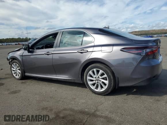 2023 Toyota Camry LE z VIN 4T1C11BK6PU073631, wystawiony jako Copart lot #85548065 z przebiegiem 15 060 mil mil oraz Szkoda całkowita • Salvage title. Historia ofert i sprzedaży dostępna na DreamBid. Obrazek 2.