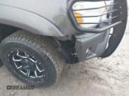 ✅ 2015 Toyota Tacoma • VIN: 3TMLU4EN7FM201302 • Lot: 41666606. Listed on IAAI with 200,504 mi. Free auction sales archive from the USA and detailed vehicle history report at DreamBid. Image 6.