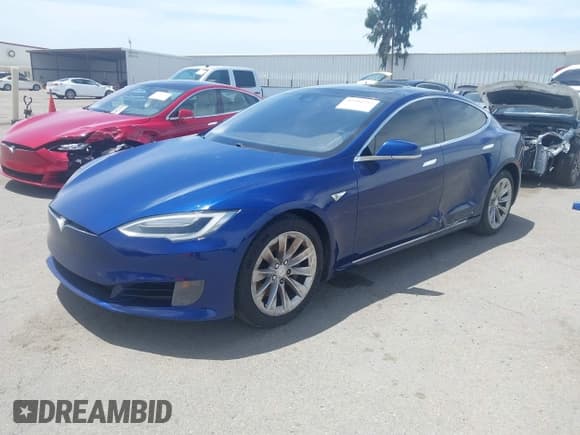 ✅ 2016 Tesla Model S 70 • VIN: 5YJSA1E19GF156501 • Lot: 42244757. Listed on IAAI with 113,579 mi. Free auction sales archive from the USA and detailed vehicle history report at DreamBid. Image 2.