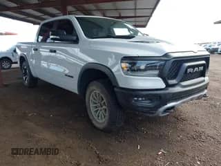 2022 Ram 1500 Rebel with VIN 1C6SRFLT3NN406752, listed as a IAAI auction lot 43346803 with 46,781 mi miles and . Bid and sale history available at DreamBid. Image 1.