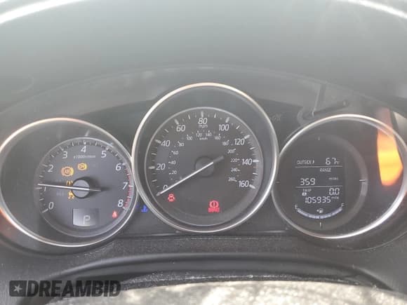 ✅ 2016 Mazda CX-5 Grand Touring • VIN: JM3KE4DY8G0890928 • Лот: 85115075. Опубликован ранее на Copart с пробегом 105 935 миль. Бесплатный доступ к архиву аукционных продаж из США и подробный отчёт об истории автомобиля на DreamBid. Изображение 9.