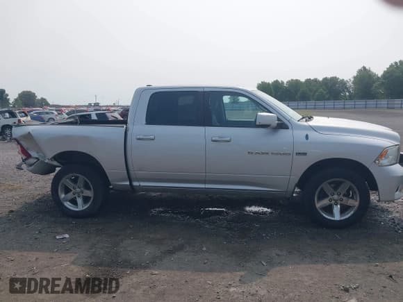 ✅ 2012 Ram 1500 Sport • VIN: 1C6RD7MTXCS114404 • Lot: 42382230. Listed on IAAI with 192,326 mi. Free auction sales archive from the USA and detailed vehicle history report at DreamBid. Image 13.