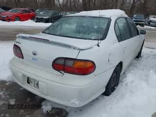 1998 Chevrolet Malibu z VIN 1G1ND52M6WY148731, wystawiony jako IAAI lot #41297219 z przebiegiem 228 054 mil mil oraz . Historia ofert i sprzedaży dostępna na DreamBid. Obrazek 4.