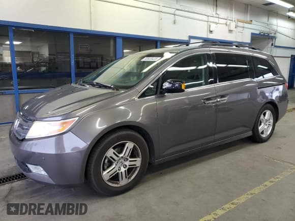 ✅ 2012 Honda Odyssey Touring • VIN: 5FNRL5H93CB011367 • Lot: 93550435. Listed on Copart with 206,124 mi. Free auction sales archive from the USA and detailed vehicle history report at DreamBid. Image 1.