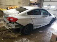 ✅ 2017 Chevrolet Cruze LT • VIN: 1G1BE5SM8H7153454 • Лот: 39254743. Опубликован ранее на Copart с пробегом 70 889 миль. Бесплатный доступ к архиву аукционных продаж из США и подробный отчёт об истории автомобиля на DreamBid. Изображение 3.