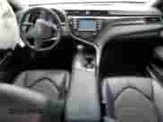 2019 Toyota Camry LE z VIN 4T1B11HK6KU820267, wystawiony jako Copart lot #80095685 z przebiegiem Nie podano mil oraz Szkoda całkowita • Salvage title. Historia ofert i sprzedaży dostępna na DreamBid. Obrazek 8.