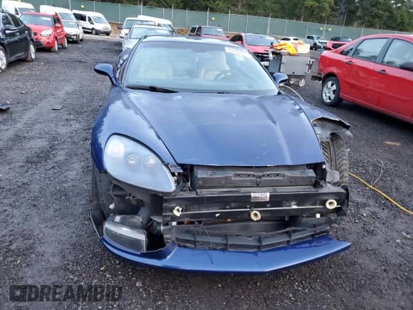 2005 Chevrolet Corvette с VIN 1G1YY24U255123323, выставлен на аукционе Copart как лот 83903624 с пробегом Не указан миль и Списание • Salvage title. История ставок и продаж доступна на DreamBid. Изображение 5.