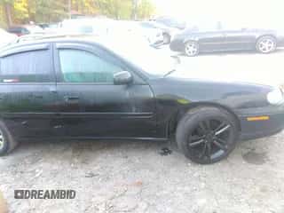 2003 Chevrolet Malibu LS z VIN 1G1NE52J13M687750, wystawiony jako IAAI lot #40649921 z przebiegiem 233 254 mil mil oraz . Historia ofert i sprzedaży dostępna na DreamBid. Obrazek 1.