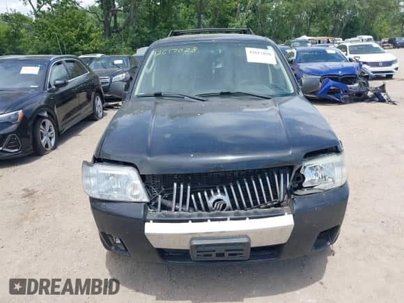 2005 Mercury Mariner Luxury with VIN 4M2CU56195DJ08478, listed as a IAAI auction lot 42617028 with 165,741 mi miles and . Bid and sale history available at DreamBid. Image 12.