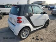 ✅ 2016 Smart fortwo Passion • VIN: WMEEJ9AA6GK843070 • Lot: 71551005. Listed on Copart with Not provided. Free auction sales archive from the USA and detailed vehicle history report at DreamBid. Image 3.