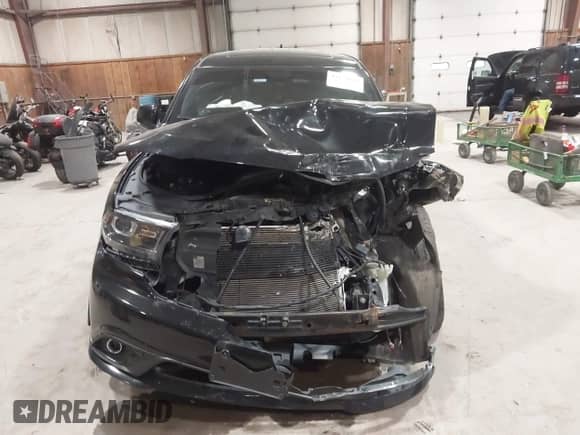 2017 Dodge Durango R/T with VIN 1C4SDJCT9HC945581, listed as a IAAI auction lot 43420044 with 143,365 mi miles and . Bid and sale history available at DreamBid. Image 12.