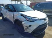 ✅ 2021 Toyota C-HR LE • VIN: JTNKHMBX0M1102350 • Lot: 42655205. Listed on IAAI with 32,880 mi. Free auction sales archive from the USA and detailed vehicle history report at DreamBid. Image 1.