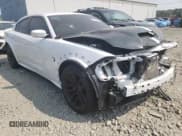 ✅ 2022 Dodge Charger SRT Hellcat Widebody • VIN: 2C3CDXL92NH237410 • Lot: 61402314. Listed on Copart with 11,985 mi. Free auction sales archive from the USA and detailed vehicle history report at DreamBid. Image 4.