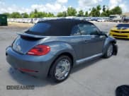 ✅ 2014 Volkswagen Beetle 2.0L TDI • VIN: 3VW5L7AT7EM817465 • Lot: 65702455. Listed on Copart with Not provided. Free auction sales archive from the USA and detailed vehicle history report at DreamBid. Image 3.