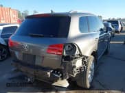 ✅ 2014 Volkswagen Touareg Sport • VIN: WVGEF9BPXED000845 • Lot: 43655040. Listed on IAAI with 107,278 mi. Free auction sales archive from the USA and detailed vehicle history report at DreamBid. Image 4.