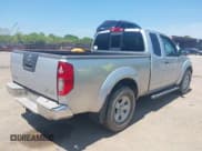 ✅ 2010 Nissan Frontier SE • VIN: 1N6AD0CW9AC421463 • Lot: 42117526. Listed on IAAI with 212,231 mi. Free auction sales archive from the USA and detailed vehicle history report at DreamBid. Image 4.