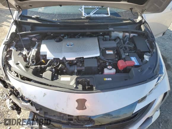 2021 Toyota Prius LE z VIN JTDKAMFP6M3174337, wystawiony jako Copart lot #81413265 z przebiegiem 142 475 mil mil oraz Szkoda całkowita • Salvage title. Historia ofert i sprzedaży dostępna na DreamBid. Obrazek 11.