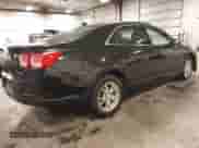 2014 Chevrolet Malibu LS z VIN 1G11A5SL8EF191539, wystawiony jako IAAI lot #42921516 z przebiegiem 129 684 mil mil oraz . Historia ofert i sprzedaży dostępna na DreamBid. Obrazek 4.