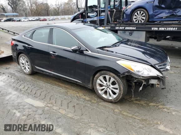 2012 Hyundai Azera z VIN KMHFG4JG4CA178058, wystawiony jako Copart lot #85165554 z przebiegiem 85 729 mil mil oraz Szkoda całkowita • Salvage title. Historia ofert i sprzedaży dostępna na DreamBid. Obrazek 4.