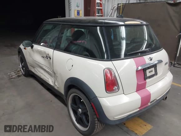 ✅ 2006 MINI Hardtop • VIN: WMWRC33506TK15034 • Lot: 42349957. Listed on IAAI with 153,596 mi. Free auction sales archive from the USA and detailed vehicle history report at DreamBid. Image 3.