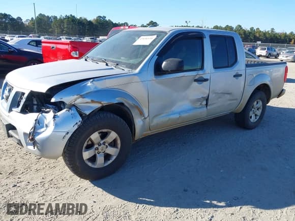 ✅ 2012 Nissan Frontier SV • VIN: 1N6AD0ER1CC474202 • Lot: 43696535. Listed on IAAI with 329,669 mi. Free auction sales archive from the USA and detailed vehicle history report at DreamBid. Image 18.