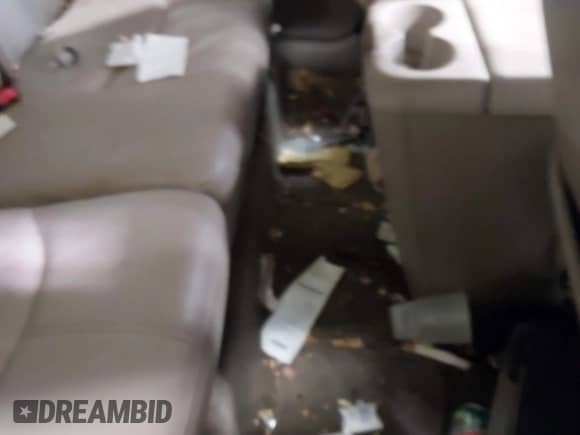 2009 Mercury Mariner Premier with VIN 4M2CU97729KJ00086, listed as a IAAI auction lot 41418490 with 167,486 mi miles and . Bid and sale history available at DreamBid. Image 8.