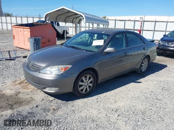 ✅ 2004 Toyota Camry LE • VIN: 4T1BE32K34U917955 • Лот: 43514589. Опубликован ранее на IAAI с пробегом 282 953 миль. Бесплатный доступ к архиву аукционных продаж из США и подробный отчёт об истории автомобиля на DreamBid. Изображение 17.
