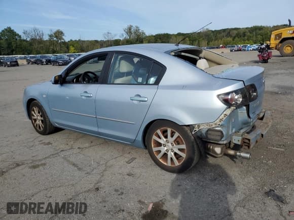 ✅ 2007 Mazda 3 i Touring • VIN: JM1BK32G971703275 • Лот: 84647815. Опубликован ранее на Copart с пробегом 128 416 миль. Бесплатный доступ к архиву аукционных продаж из США и подробный отчёт об истории автомобиля на DreamBid. Изображение 2.