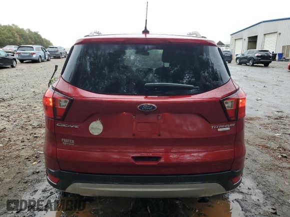 ✅ 2019 Ford Escape Titanium • VIN: 1FMCU0J98KUC33033 • Lot: 90056535. Listed on Copart with 96,806 mi. Free auction sales archive from the USA and detailed vehicle history report at DreamBid. Image 6.