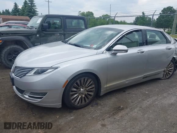 ✅ 2013 Lincoln MKZ • VIN: 3LN6L2J91DR800981 • Lot: 42428215. Wystawiony na IAAI z przebiegiem 106 813 mil. Bezpłatny archiwum sprzedaży aukcyjnych z USA i szczegółowy raport historii pojazdu na DreamBid. Zdjęcie 2.