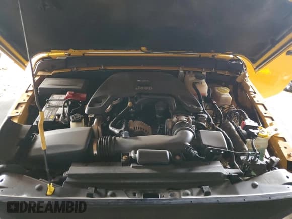 ✅ 2019 Jeep Wrangler Sport S • VIN: 1C4GJXAG8KW501136 • Lot: 64523075. Listed on Copart with 38,033 mi. Free auction sales archive from the USA and detailed vehicle history report at DreamBid. Image 12.