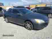 2005 Honda Accord LX with VIN 1HGCM71325A010518, listed as a Copart auction lot 51528035 with 216,865 mi miles and Salvage title. Bid and sale history available at DreamBid. Image 4.