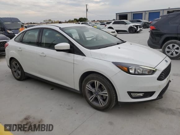 ✅ 2018 Ford Focus SE • VIN: 1FADP3FE7JL229119 • Lot: 87000115. Listed on Copart with 138,033 mi. Free auction sales archive from the USA and detailed vehicle history report at DreamBid. Image 4.