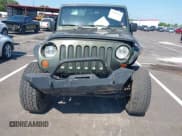 ✅ 2007 Jeep Wrangler Unlimited Sahara • VIN: 1J4GA59157L198095 • Lot: 43011519. Listed on IAAI with 198,022 mi. Free auction sales archive from the USA and detailed vehicle history report at DreamBid. Image 6.