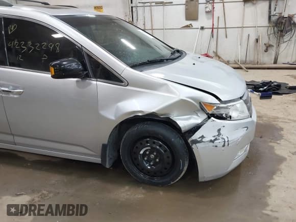 ✅ 2012 Honda Odyssey Touring • VIN: 5FNRL5H99CB052361 • Lot: 42332298. Listed on IAAI with 185,914 mi. Free auction sales archive from the USA and detailed vehicle history report at DreamBid. Image 6.