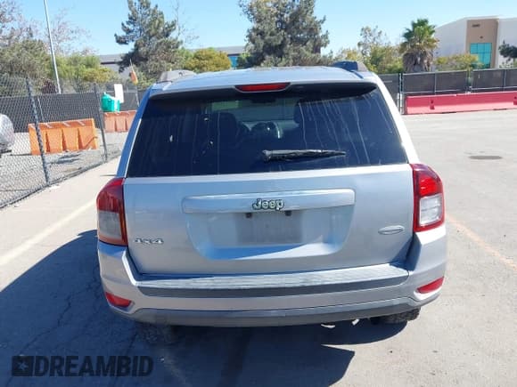 ✅ 2014 Jeep Compass Latitude • VIN: 1C4NJDEB4ED770674 • Lot: 43537441. Listed on IAAI with 169,190 mi. Free auction sales archive from the USA and detailed vehicle history report at DreamBid. Image 16.