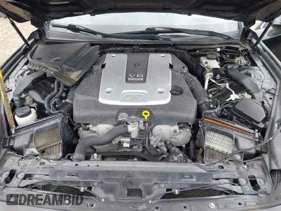 ✅ 2014 Infiniti Q50 Premium • VIN: JN1BV7AP4EM671267 • Lot: 42296272. Listed on IAAI with 206,094 mi. Free auction sales archive from the USA and detailed vehicle history report at DreamBid. Image 10.