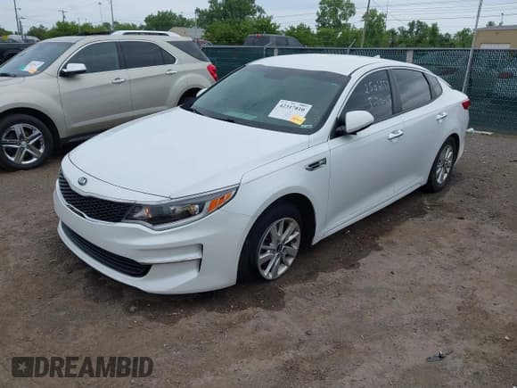 ✅ 2018 Kia Optima S • VIN: 5XXGT4L38JG184817 • Lot: 42317810. Listed on IAAI with 98,734 mi. Free auction sales archive from the USA and detailed vehicle history report at DreamBid. Image 16.