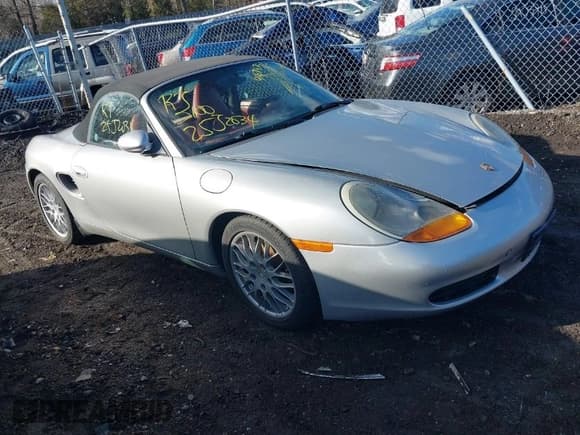 ✅ 1997 Porsche Boxster • VIN: WP0CA2985VS622054 • Lot: 41679752. Listed on IAAI with Not provided. Free auction sales archive from the USA and detailed vehicle history report at DreamBid. Image 1.