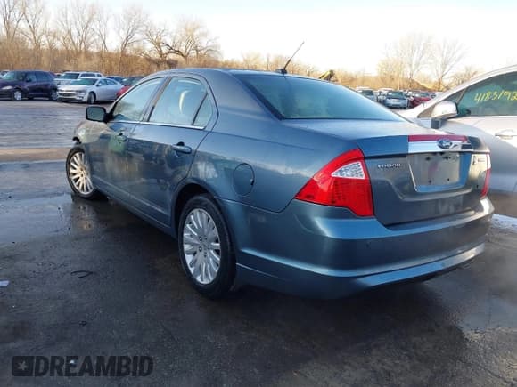 ✅ 2011 Ford Fusion Hybrid • VIN: 3FADP0L31BR178592 • Lot: 41800821. Listed on IAAI with 57,054 mi. Free auction sales archive from the USA and detailed vehicle history report at DreamBid. Image 3.