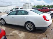 ✅ 2014 Lincoln MKS • VIN: 1LNHL9DK7EG601720 • Lot: 42464979. Listed on IAAI with 58,163 mi. Free auction sales archive from the USA and detailed vehicle history report at DreamBid. Image 14.