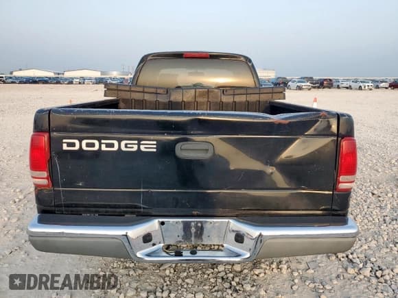 ✅ 2001 Dodge Dakota • VIN: 1B7GL22X01S328598 • Lot: 57521505. Wystawiony na Copart z przebiegiem 207 173 mil. Bezpłatny archiwum sprzedaży aukcyjnych z USA i szczegółowy raport historii pojazdu na DreamBid. Zdjęcie 6.