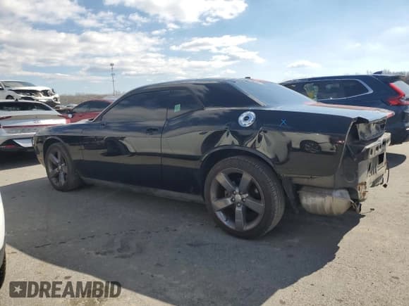 ✅ 2012 Dodge Challenger SXT • VIN: 2C3CDYAG1CH295111 • Lot: 46414165. Wystawiony na Copart z przebiegiem 129 840 mil. Bezpłatny archiwum sprzedaży aukcyjnych z USA i szczegółowy raport historii pojazdu na DreamBid. Zdjęcie 2.