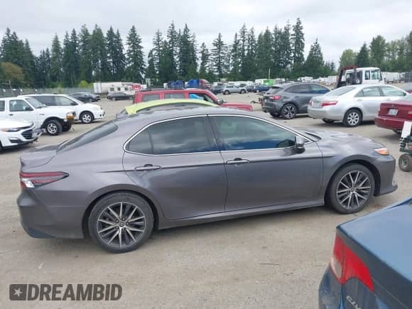 2022 Toyota Camry Hybrid XLE with VIN 4T1F31AK6NU575433, listed as a IAAI auction lot 42841689 with 65,526 mi miles and . Bid and sale history available at DreamBid. Image 13.