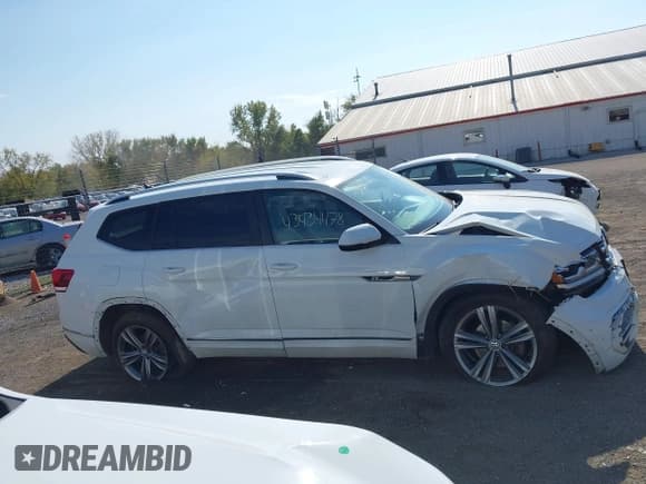 ✅ 2018 Volkswagen Atlas SE • VIN: 1V2PR2CA1JC595668 • Lot: 43434478. Listed on IAAI with 125,744 mi. Free auction sales archive from the USA and detailed vehicle history report at DreamBid. Image 13.