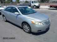 ✅ 2009 Toyota Camry LE • VIN: JTNBK46K893038974 • Lot: 42590939. Listed on IAAI with 214,794 mi. Free auction sales archive from the USA and detailed vehicle history report at DreamBid. Image 1.