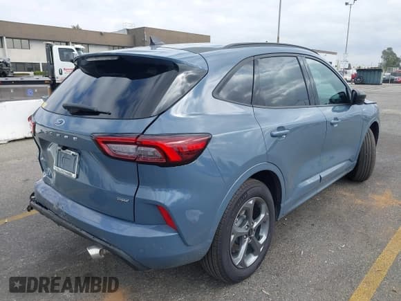 ✅ 2024 Ford Escape ST-Line • VIN: 1FMCU0MZ8RUB23637 • Lot: 43423036. Listed on IAAI with 12,089 mi. Free auction sales archive from the USA and detailed vehicle history report at DreamBid. Image 4.