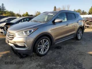 2017 Hyundai Santa Fe 2.0T with VIN 5XYZUDLAXHG453538, listed as a Copart auction lot 69907165 with 102,694 mi miles and Salvage title. Bid and sale history available at DreamBid. Image 1.